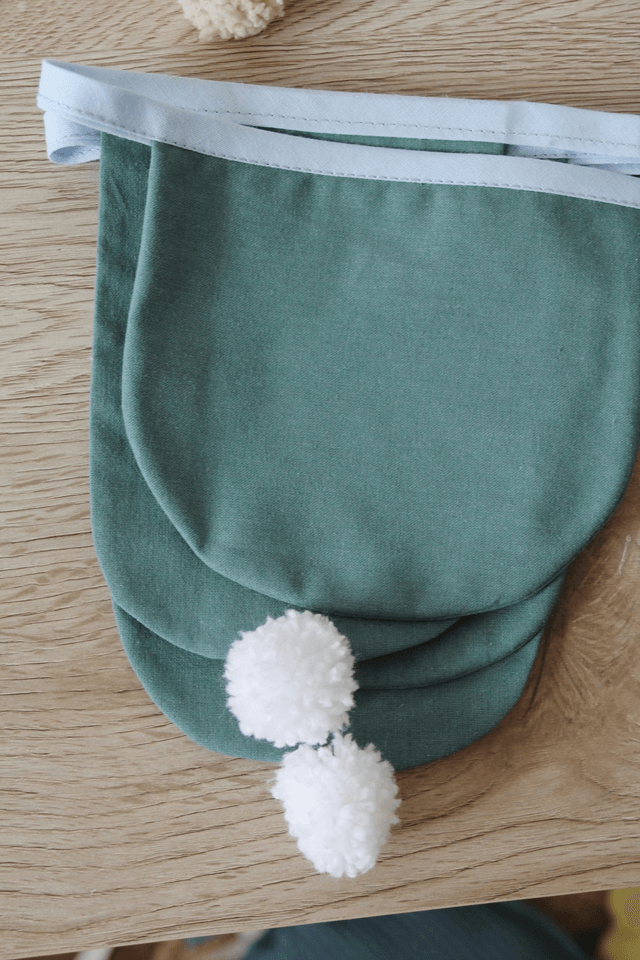 Guirlande à pompons - vert/bleu